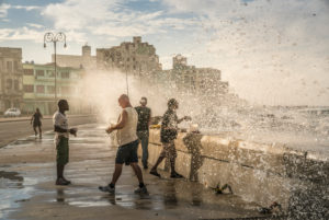 Anglers at the Malecon Havana, splashing surf, drops of water, Cuba Anglers at the Malecon Havana, splashing surf, drops of water, Cuba